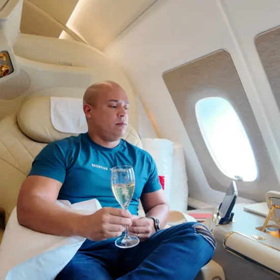 Emirates A380 First Class Suite with Champagne on Hand