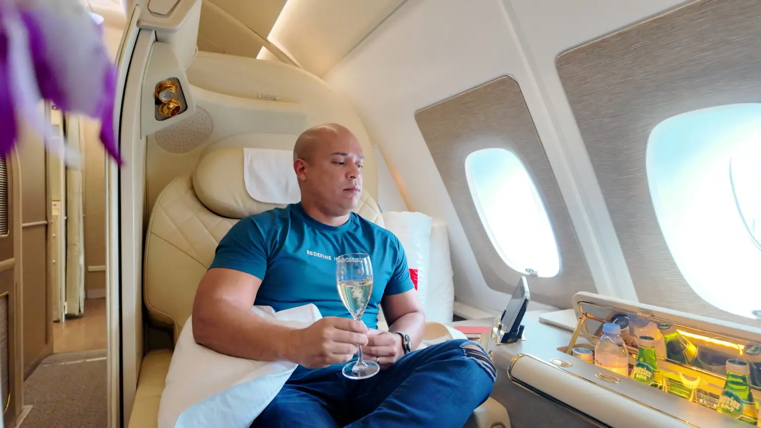 Emirates A380 First Class Suite with Champagne on Hand