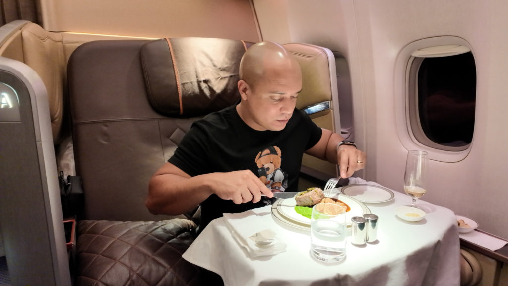 Eating braised beef in the Singapore Airlines